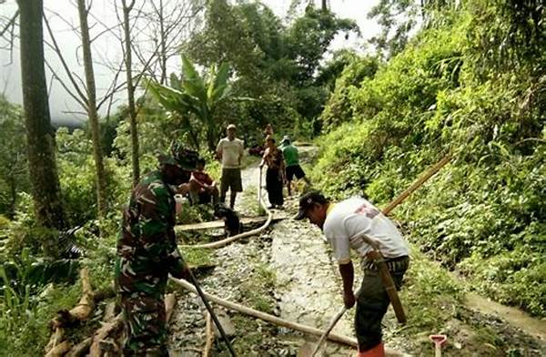 warga-gampong-teungoh-langsa-gotong-royong-bersihkan-saluran-drainase_878b78137.jpg