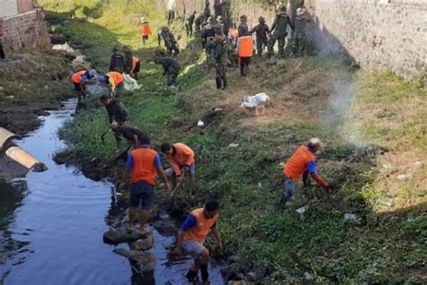 warga-langsa-gotong-royong-bersihkan-sungai-antisipasi-banjir_078e296cd.jpg